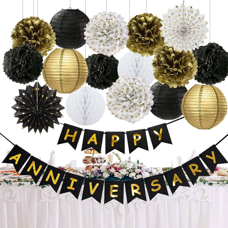 a black an white banner style garland saying happy anniversary